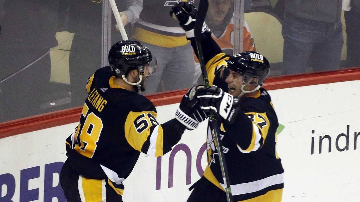 Sidney Crosby and Kris Letang celebrate OT goal