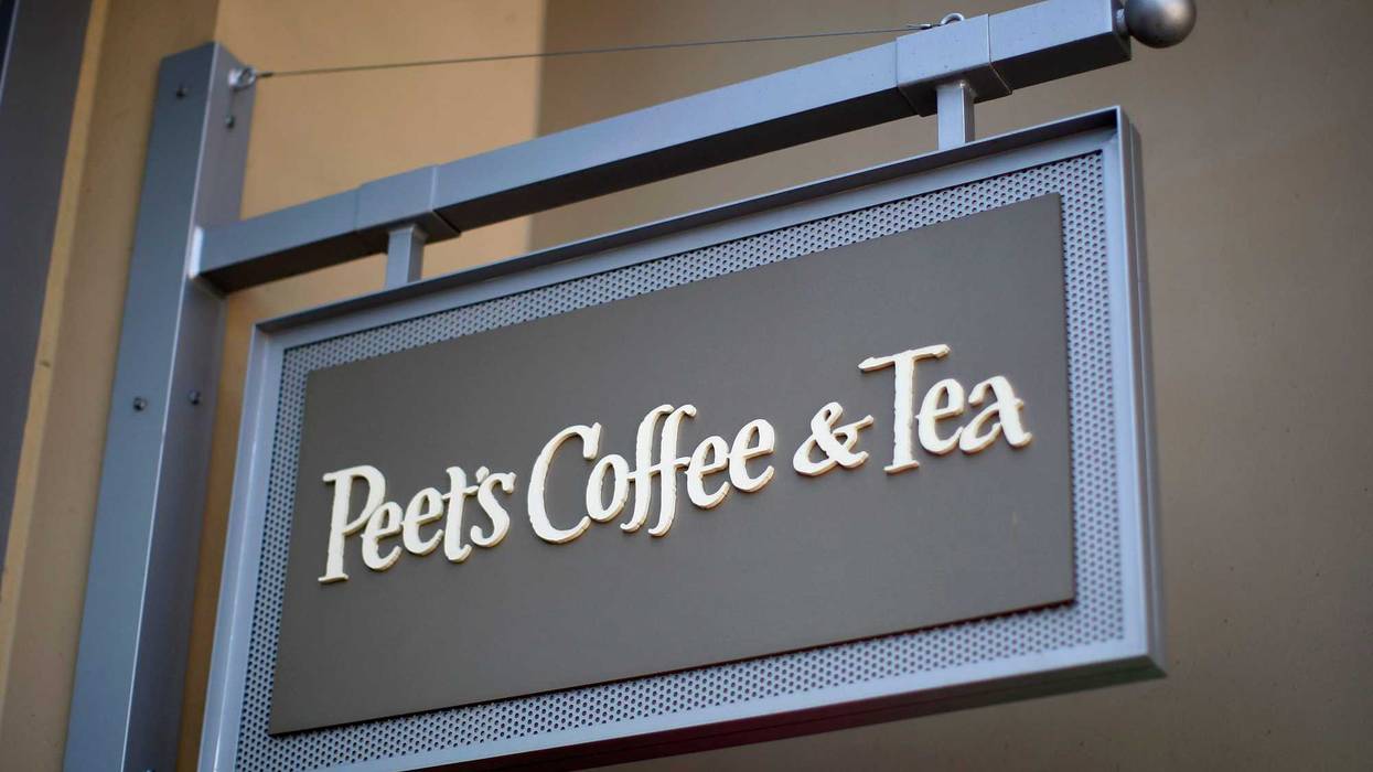 Signage hangs outside a Peet's Coffee and Tea store on July 23, 2012 in Seal Beach, California.