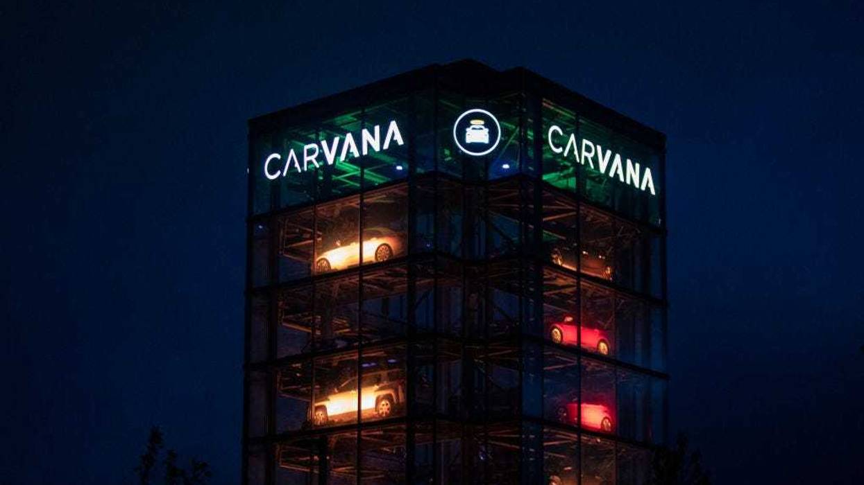 Signage outside a Carvana Vending Machine location in in Novi, Michigan on Sunday, Oct. 31, 2021.