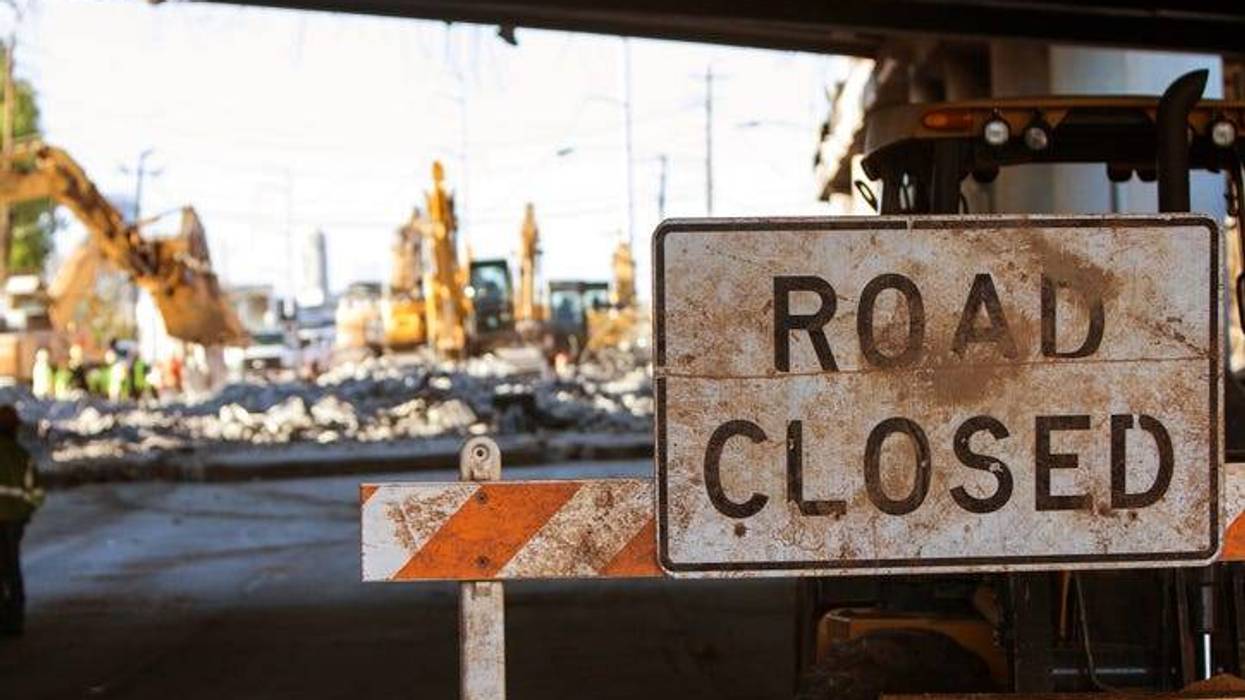 Significant damage to an overpass along US-23 has caused all northbound lanes to close after truck that was hauling a backhoe smashed into the bridge.