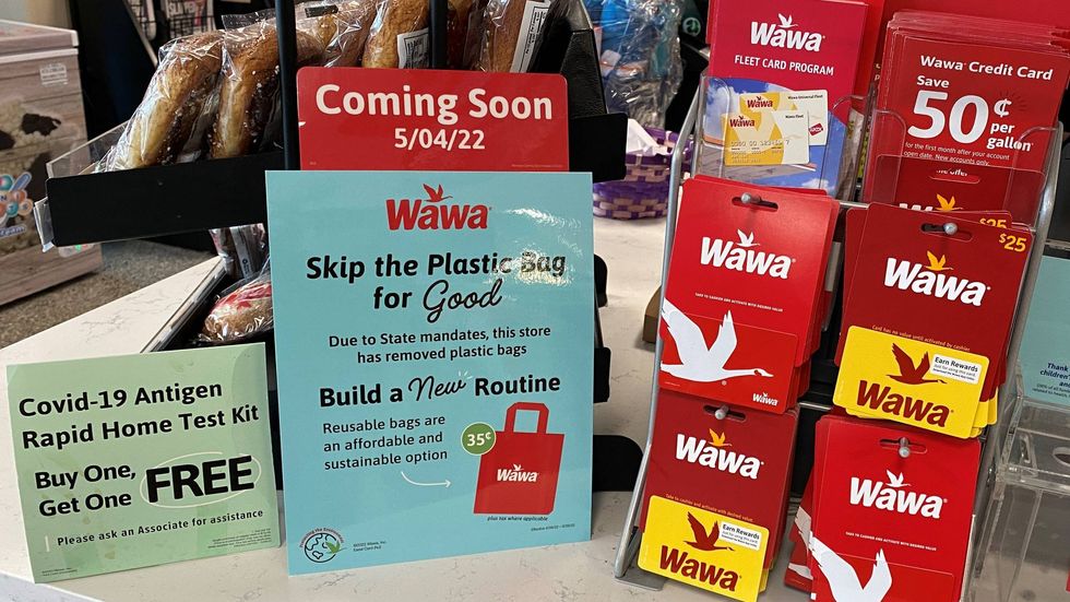 Signs at Wawa for reusable bags.