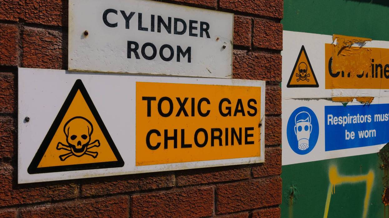 Signs warning of the presence of Chlorine gas