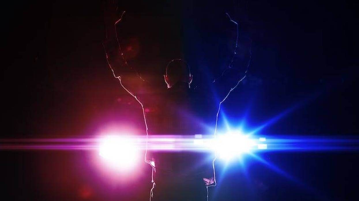 Silhouette of man getting arrested