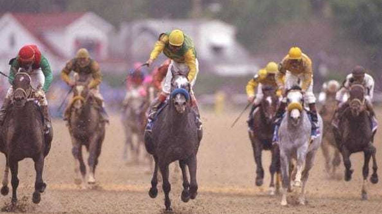 Silver Charm and Captain Bodgit fight for first place at the 123rd Kentucky Derky at Churchill Downs in Louisville, Kentucky. Silver Charm won the race.