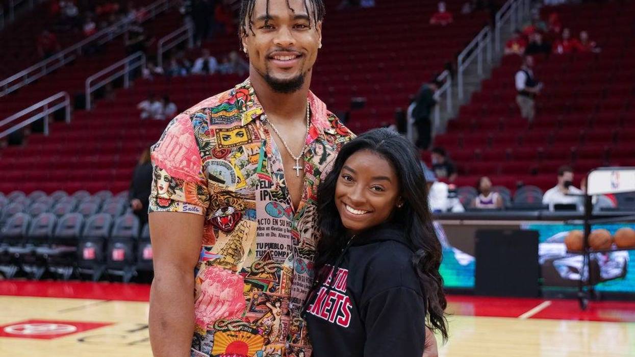 Simone Biles and Jonathan Owens attend a game between the Houston Rockets and the Los Angeles Lakers at Toyota Center on December 28, 2021 in Houston, Texas.