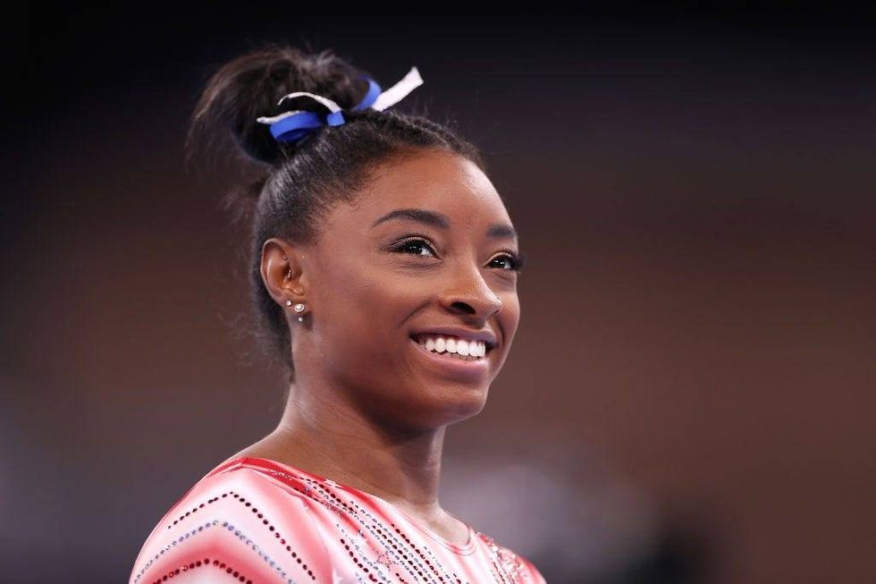 Simone Biles is 'beaching until further notice' in a chic bikini while on vacation