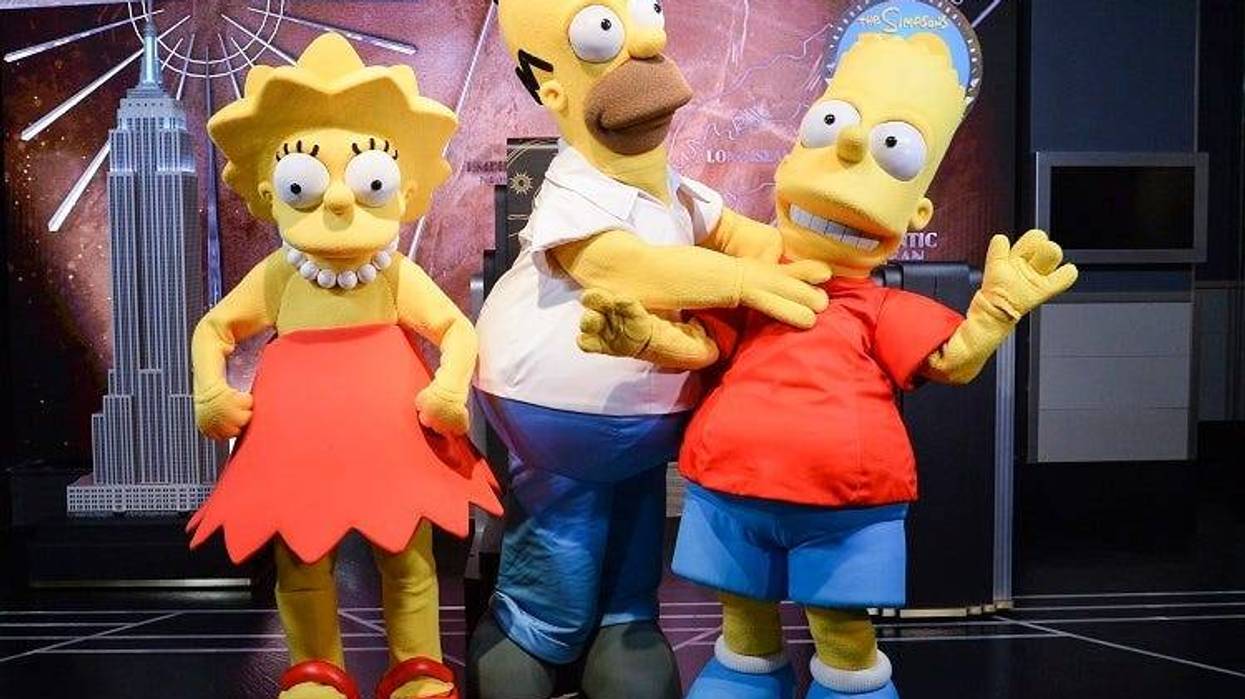 Simpsons Costumed characters, participate in the ceremonial lighting of the Empire State Building as they attend the Empire State Building Celebration of the 30th Anniversary of FOX's "The Simpsons" on December 17, 2018 in New York City. (Photo by Anthon