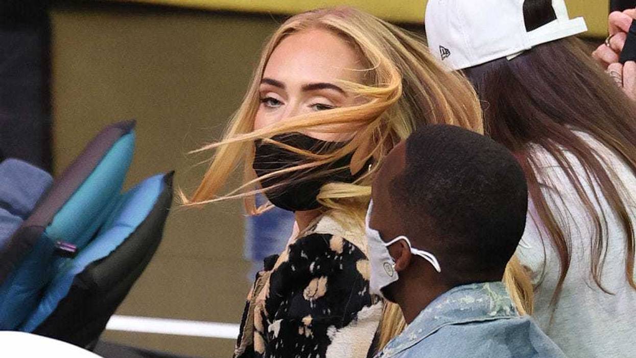 Singer Adele looks on next to Rich Paul during the first half in Game Five of the NBA Finals between the Milwaukee Bucks and the Phoenix Suns at Footprint Center on July 17, 2021, in Phoenix.