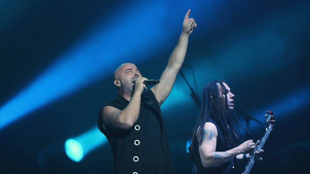 Singer David Draiman (L) and bassist John Moyer of Disturbed perform at T-Mobile Arena on January 12, 2019 in Las Vegas, Nevada.