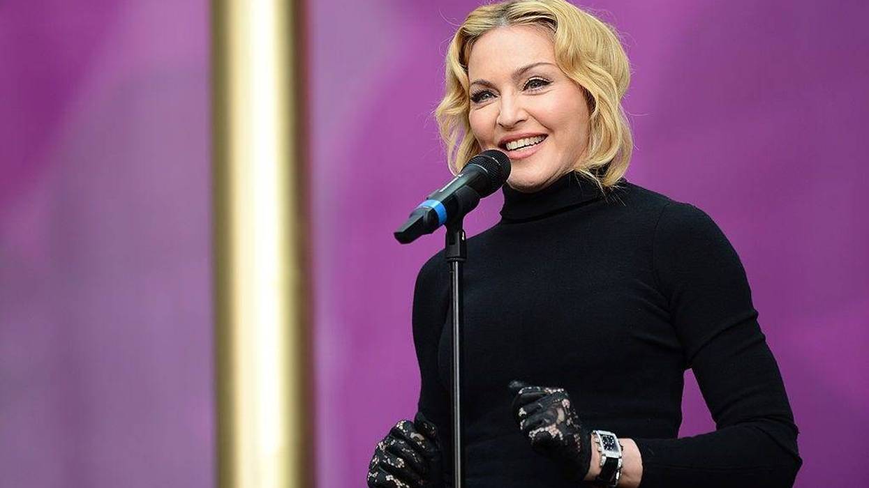 Singer Madonna speaks on stage at the "Chime For Change: The Sound Of Change Live" Concert at Twickenham Stadium on June 1, 2013 in London, England.