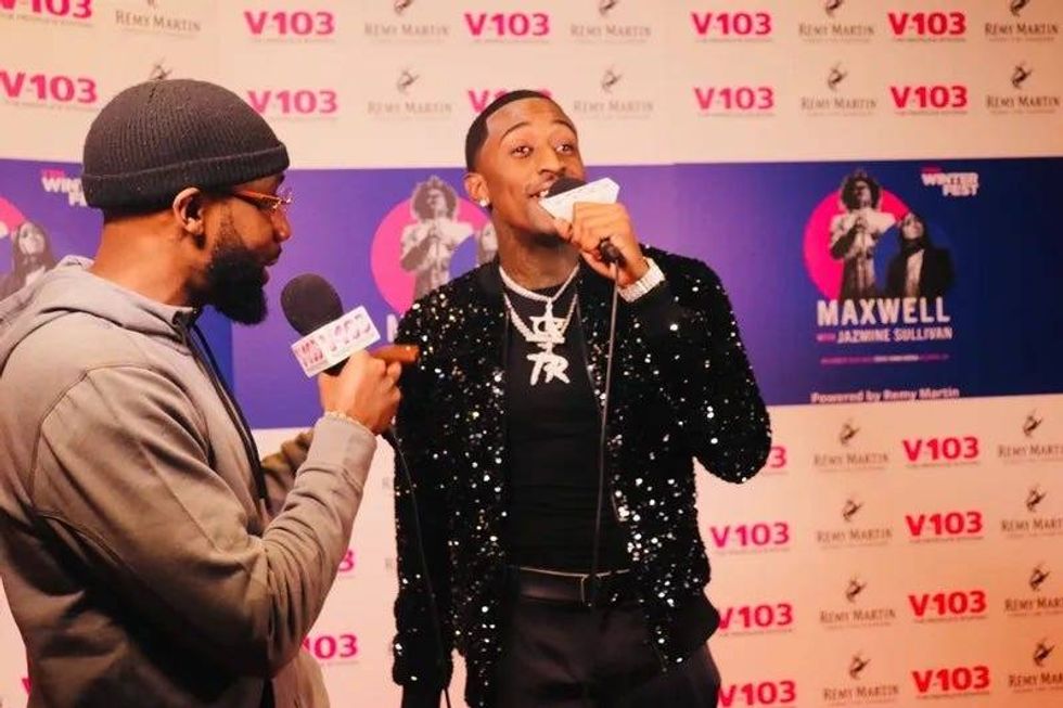 Singer T-Royal speaking with DJ Sturgess.