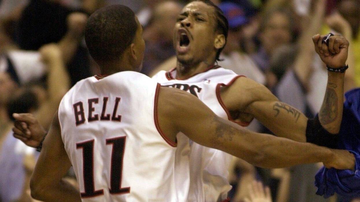 Sixer Allen Iverson does a chest slam with Raja Bell during Game 7 of the NBA Eastern Conference Finals at the First Union Center in Philadelphia, Pennsylvania Sunday June 3, 2001.