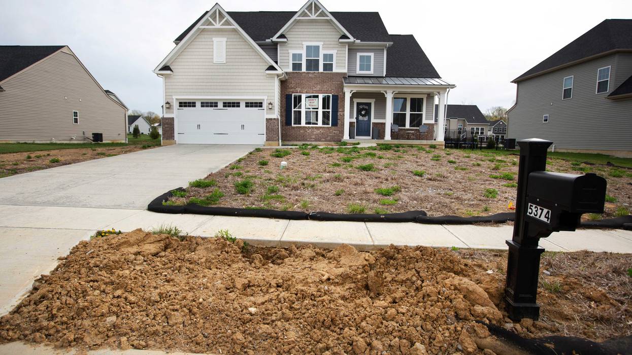 Sixteen months after Mike and Tasha Amos moved into what they thought would be their 'dream home', their front lawn still had not been landscaped and their mailbox was in the wrong spot. Their five-year-old, Preston, would tell people they lived in a 'mud