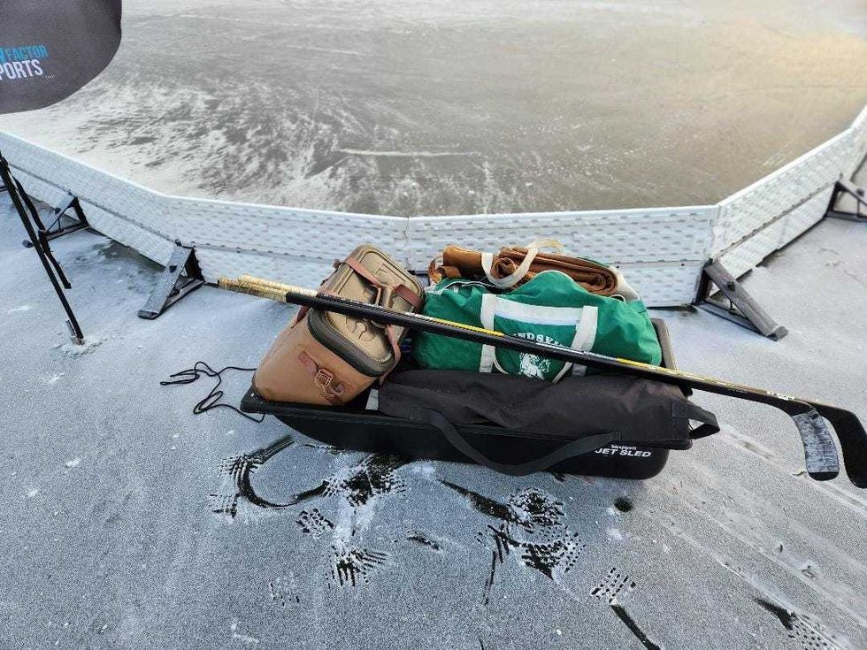 Sled with hockey stuff