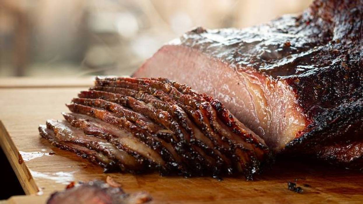 Sliced BBQ brisket on a cutting board