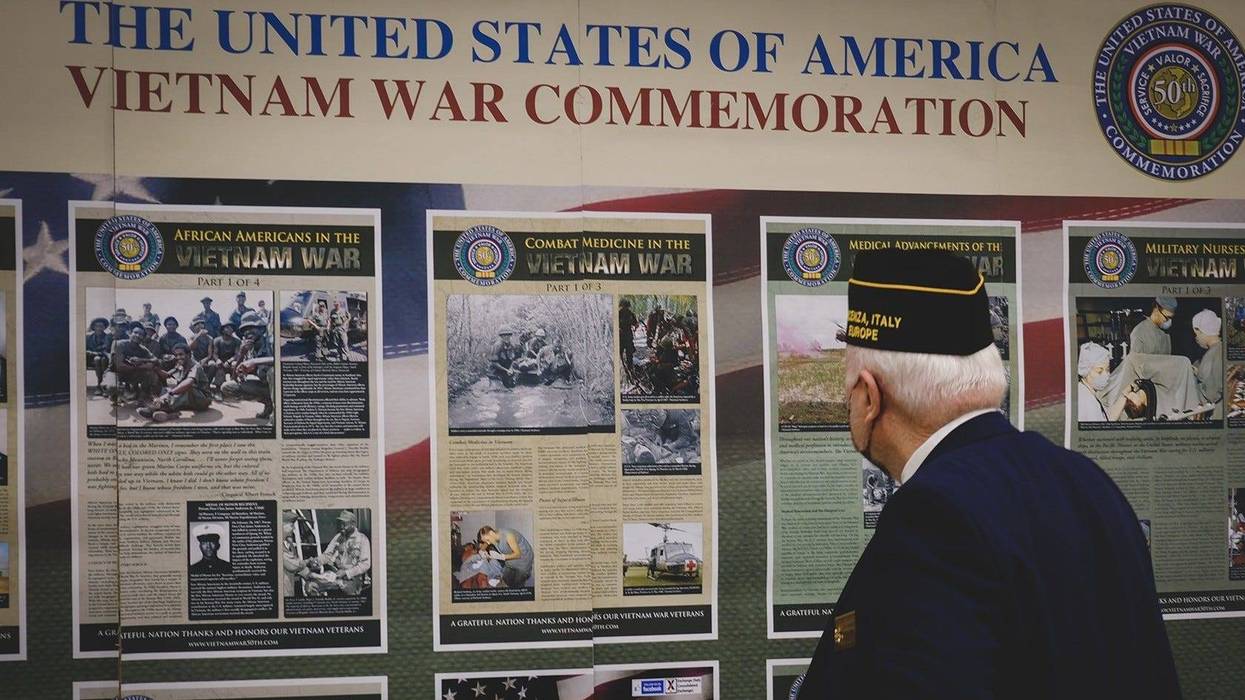 Smiles underneath Vietnam veterans’ masks, despite COVID-19 setbacks