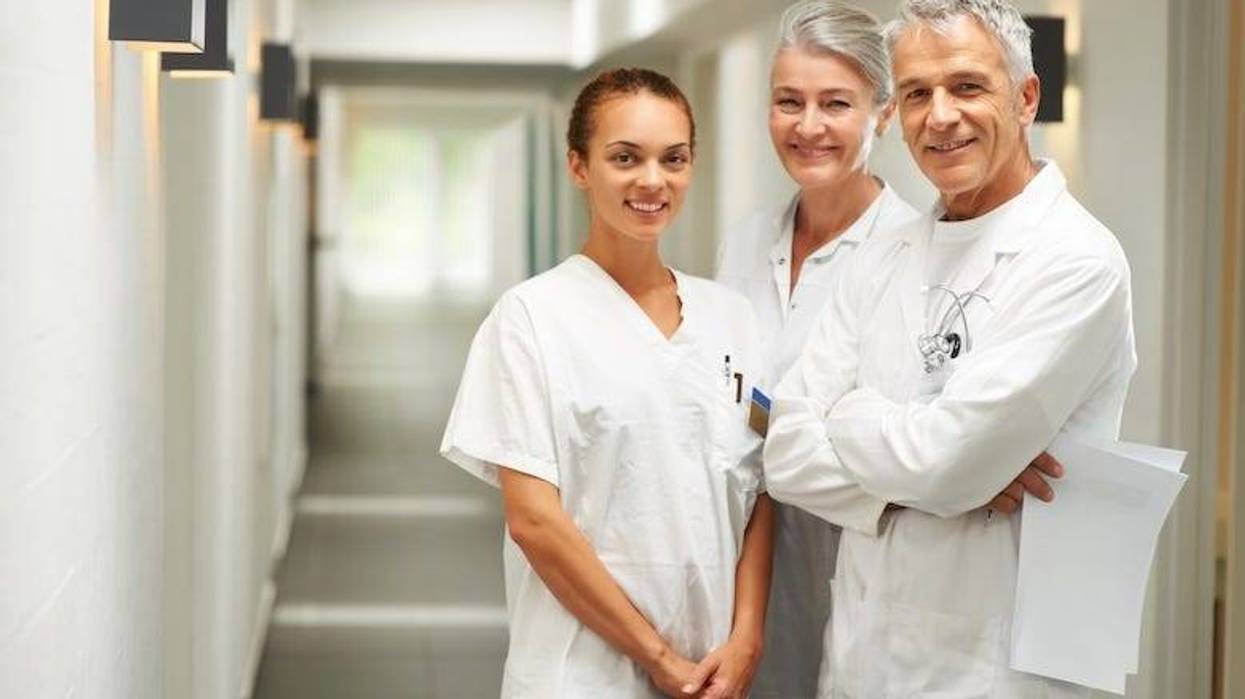 Smiling medical workers in hospital