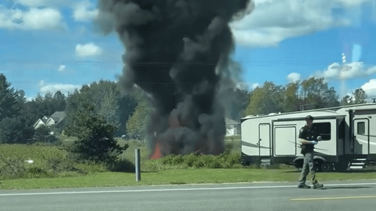 Smoke and fire on scene of jet crash