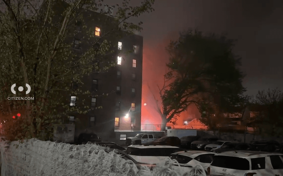 Smoke and the glow of flames were seen over the garage on 89th Avenue after the explosion