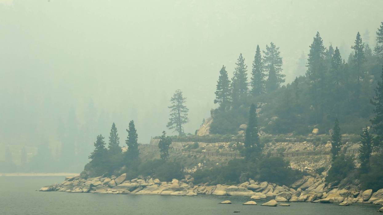 Smoke from the Dixie and Caldor fires in California covers Lake Tahoe in the Incline, Nev., area on Aug. 24, 2021.