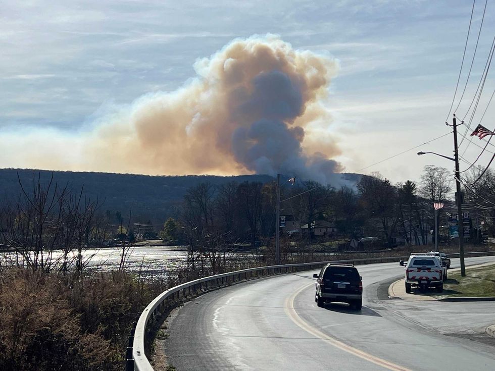 Smoke from the Jennings Creek wildfire, which extends between New Jersey and New York, on Sunday, Nov. 17.