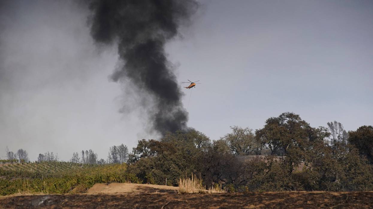Smoke rises from a fire site in Sonoma County on Oct. 24, 2019.