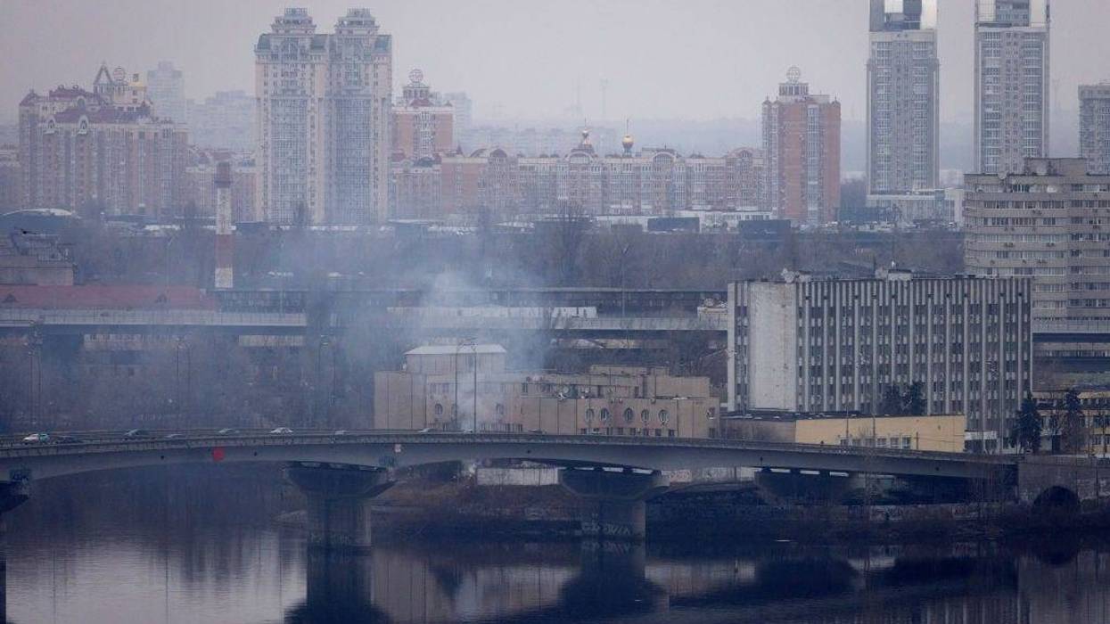Smoke rises from outside an intelligence building on February 24, 2022 in Kyiv, Ukraine. Overnight, Russia began a large-scale attack on Ukraine