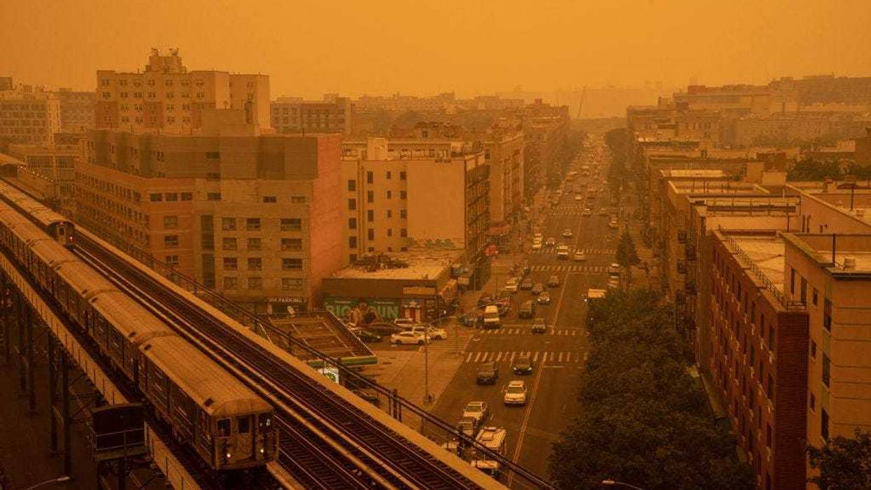 Smoky haze from wildfires in Canada blankets a neighborhood on June 7, 2023, in the Bronx borough of New York City.