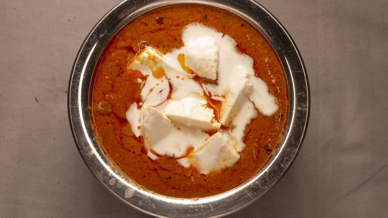 Smooth Paneer Dolled Up with Fluffy Cream and Bright Orange Sauce