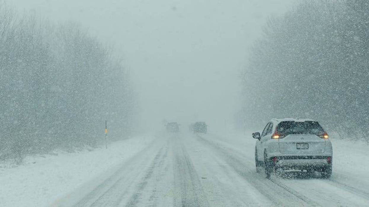 Snow and ice storm kills, delays travel