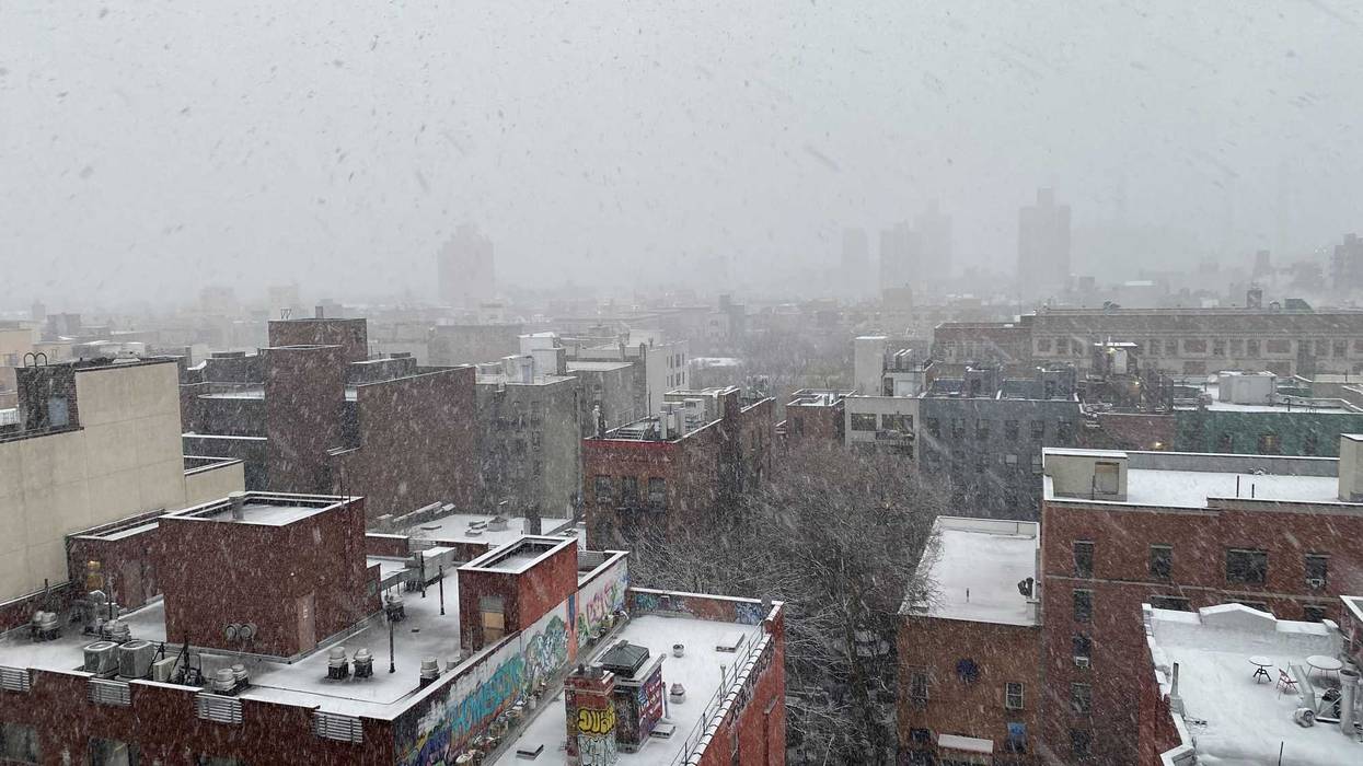 Snow falls on Manhattan on the morning of Feb. 13, 2024