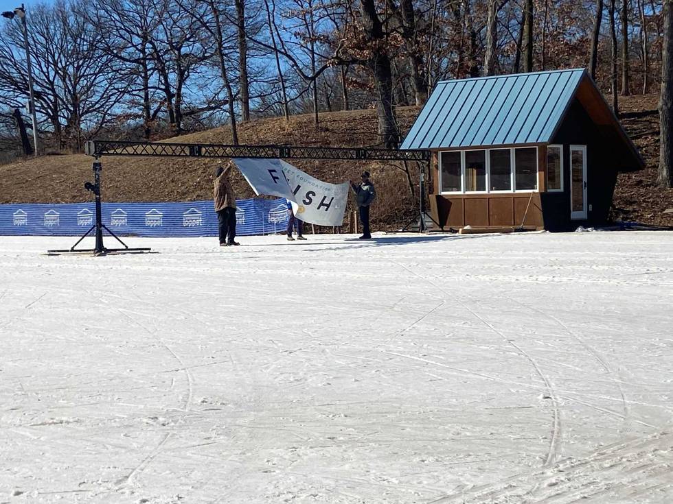 Snow is ready and the finish line is going up for the Loppet Winter Festival at Theodore Wirth Park.