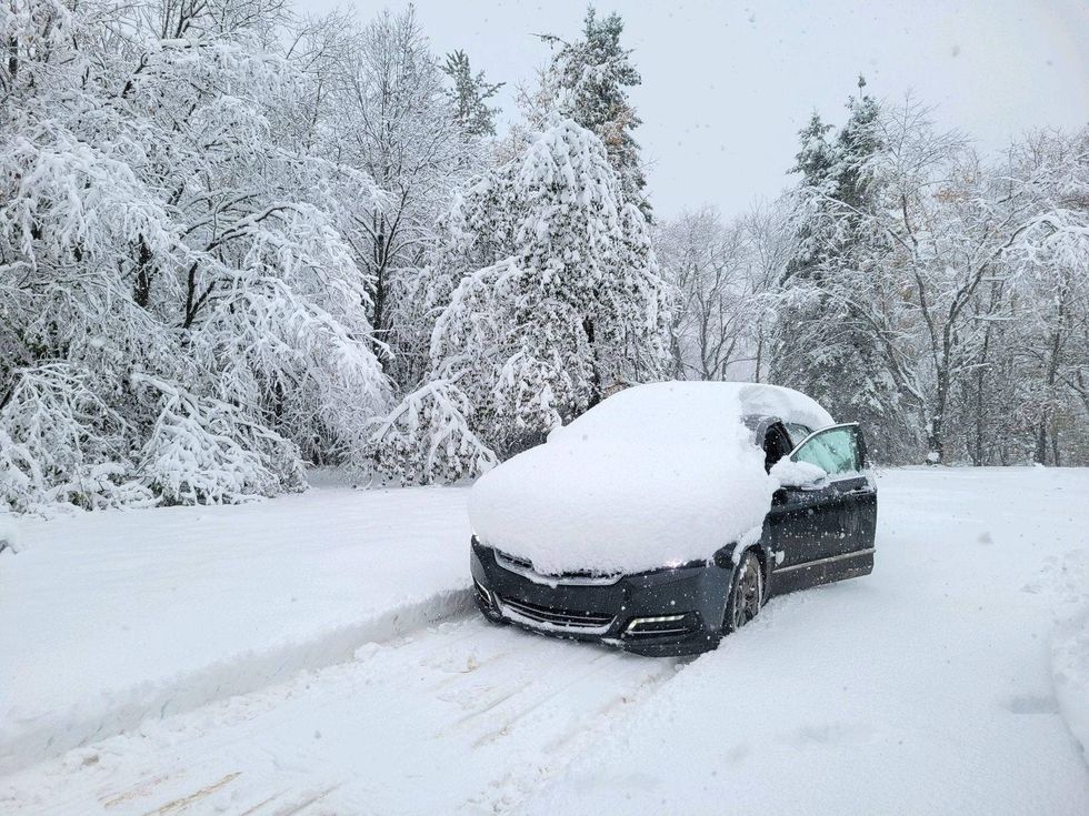 Snow on car in Herman, Michigan