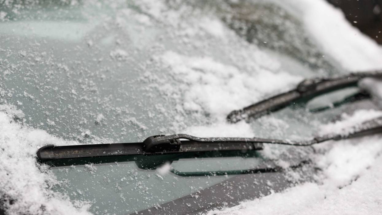 Snow on car windshield