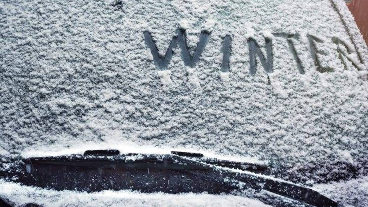 snow on windshield of car