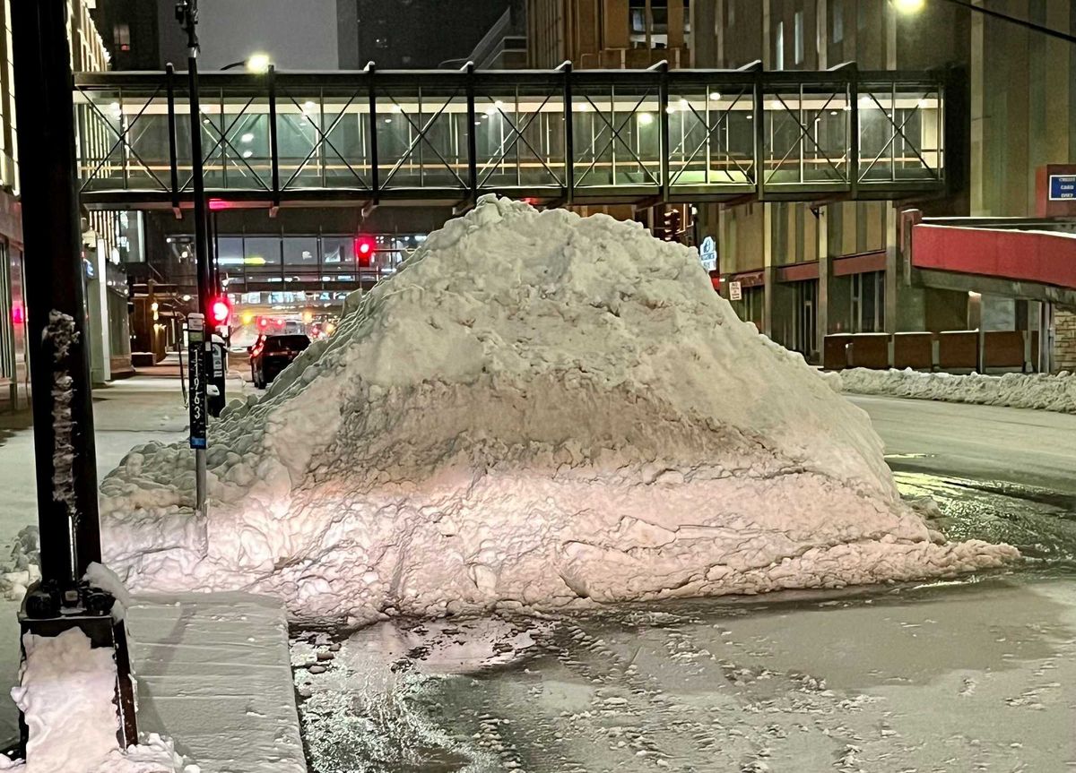 Snow piles downtown Minneapolis