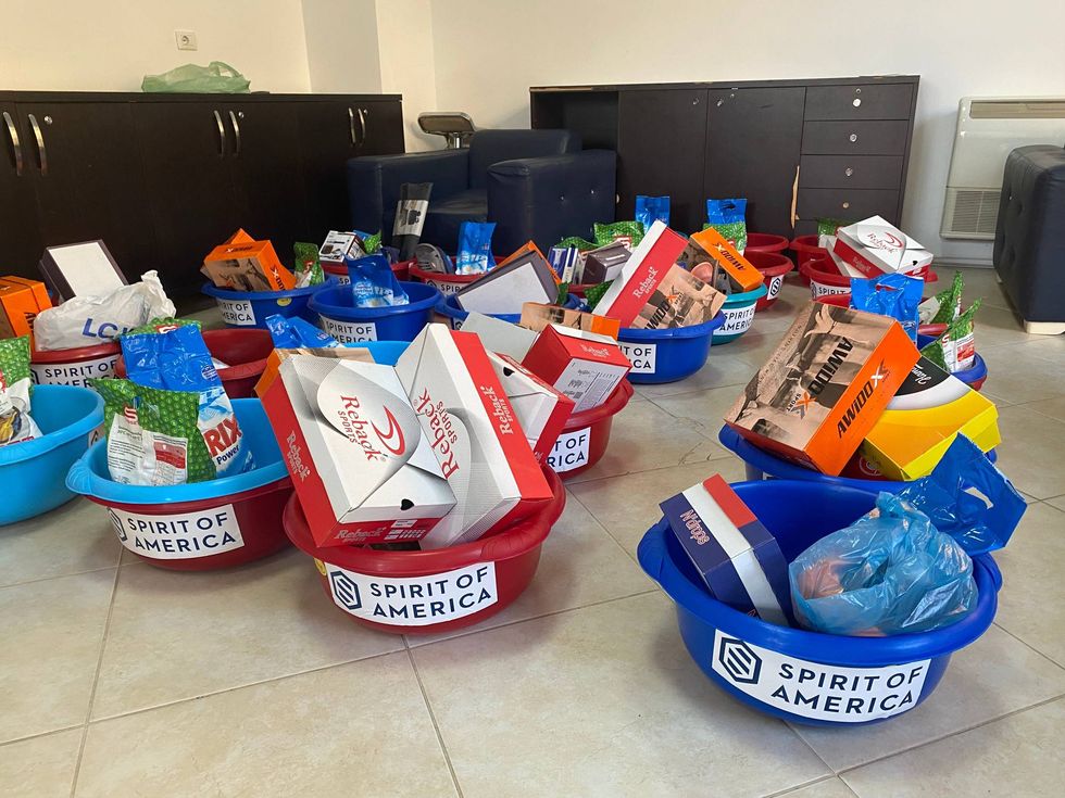 SoA brings emergency needs to our group - laundry basins, washing powder, shoes, hygiene supplies, clothing, etc.