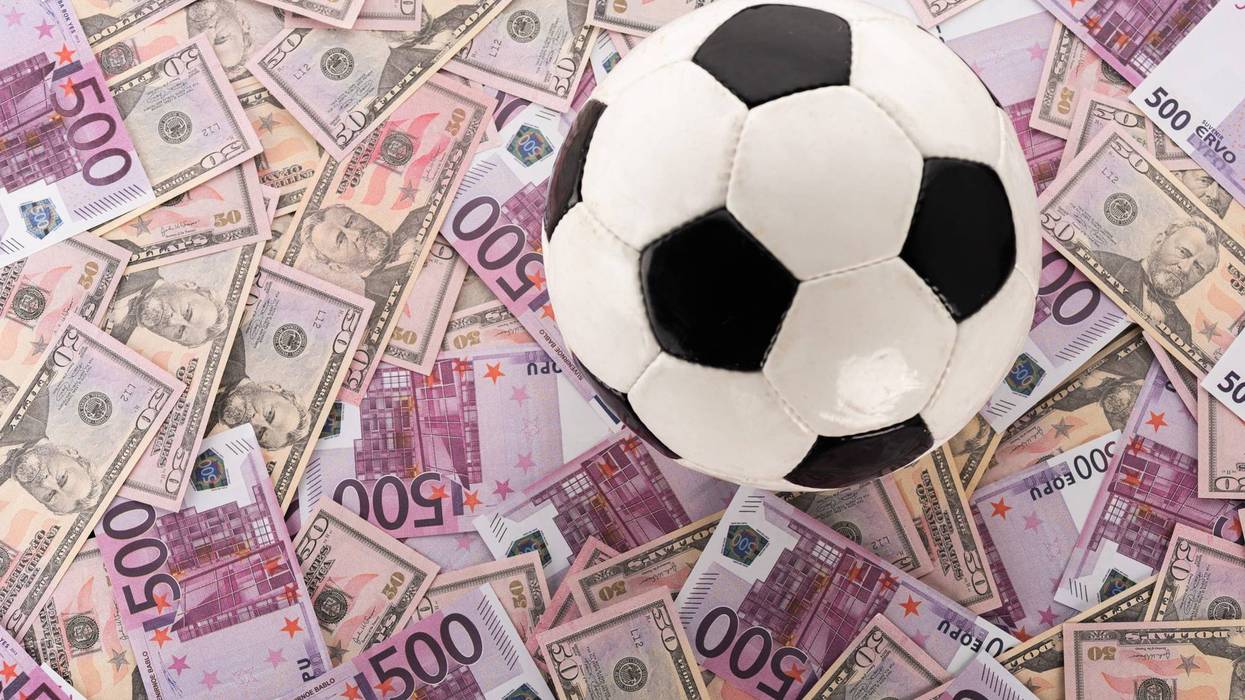 soccer ball and money
