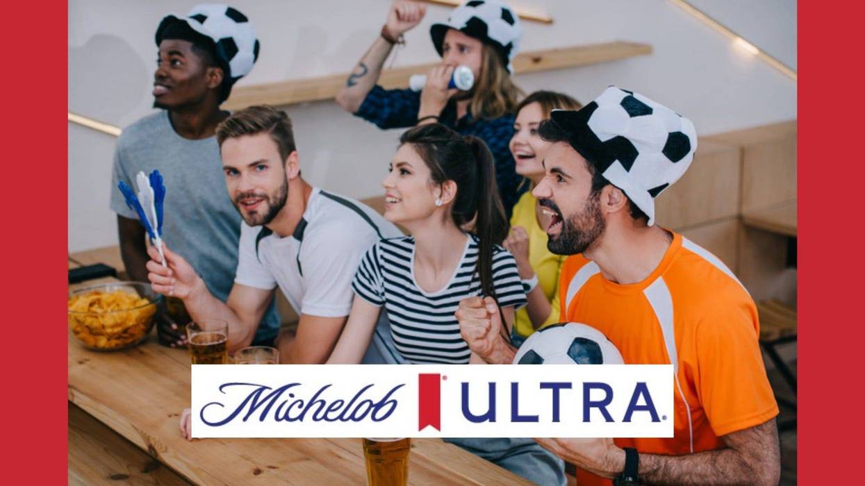 Soccer Fans watching a game drinking beer