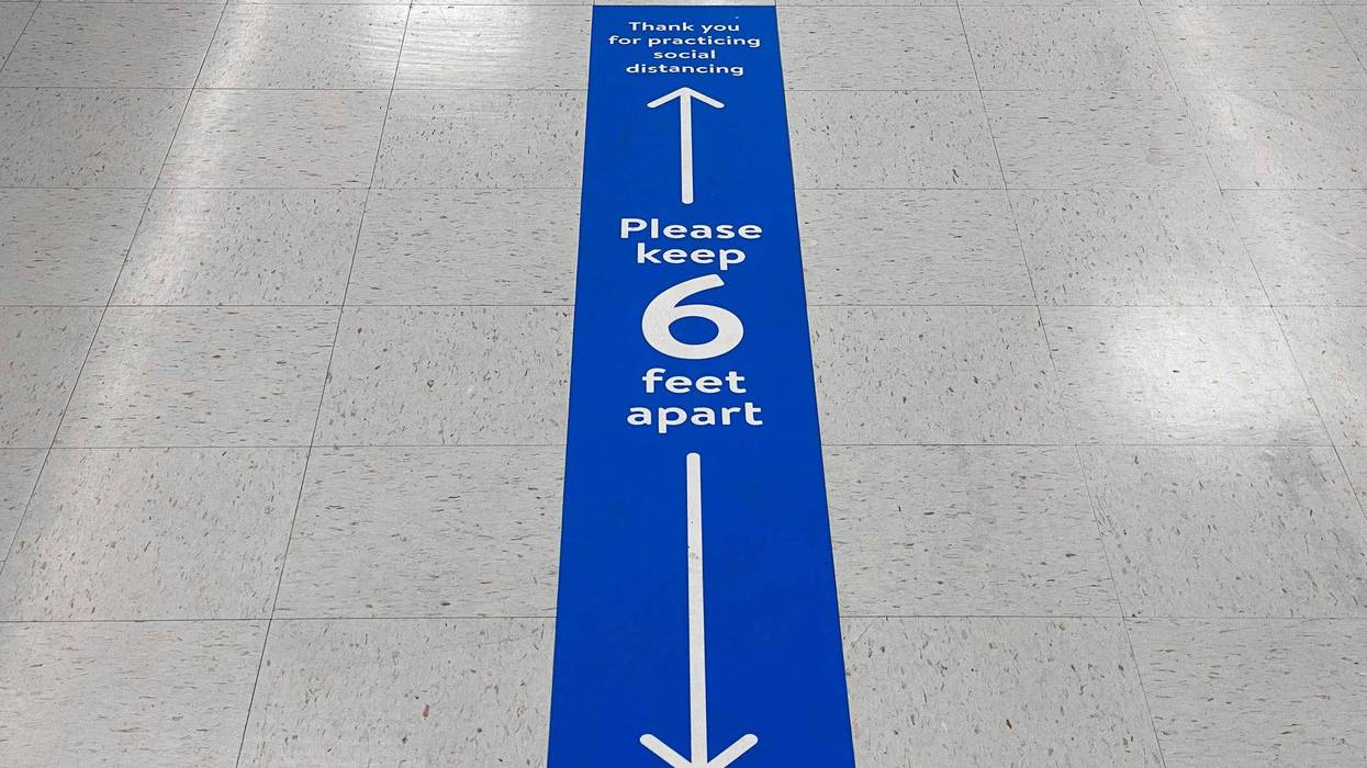 Social distancing floor sign