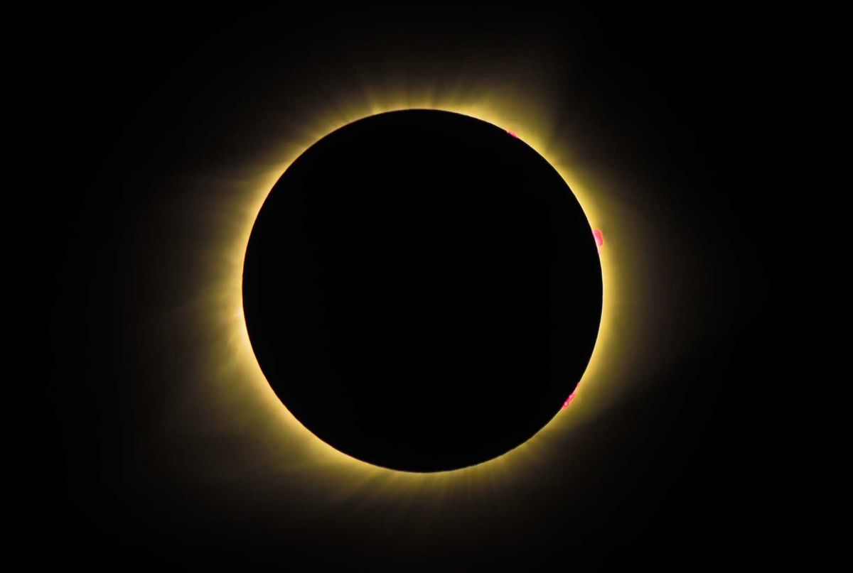 Solar Eclipse engulfed in a shadow cast by the Moon