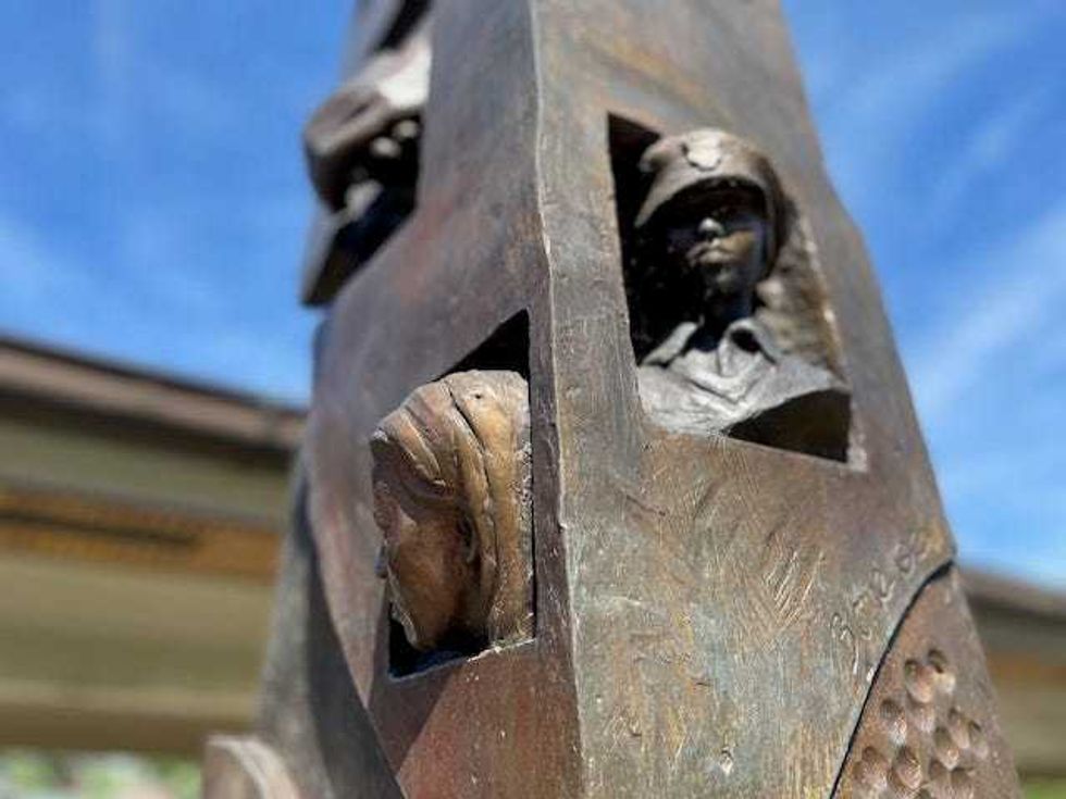 Some pieces of concrete still remain in the beams, in others, sculptures of the faces of first responders, as well as everyday Americans caught up in the events of Sept. 11.
