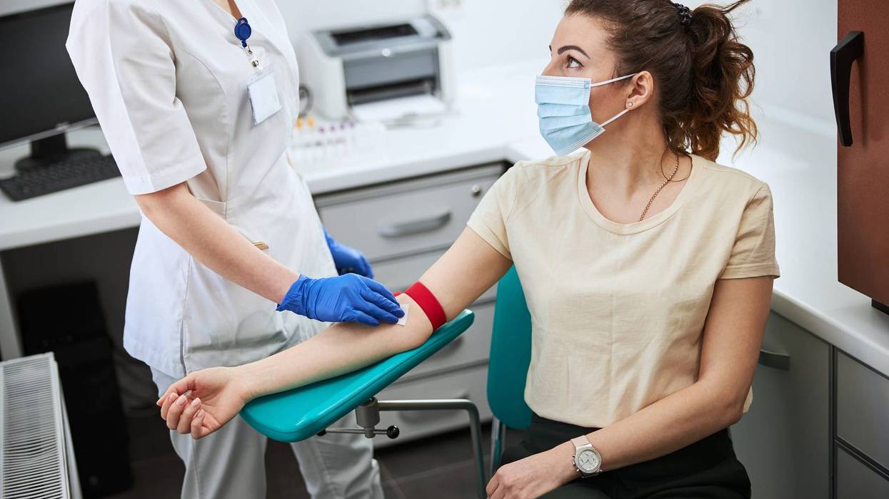 Someone donating blood.