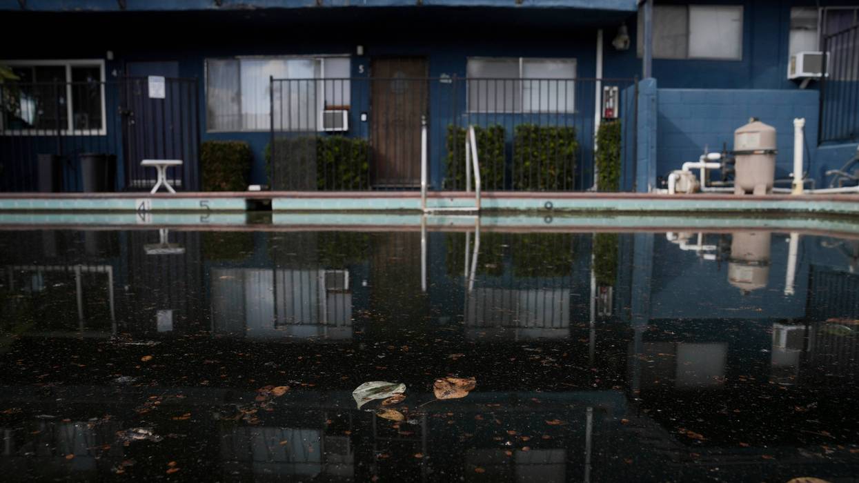 Soot and Ash covers a swimming pool after the Eaton Fire Friday, Jan. 17, 2025 in Altadena, Calif.