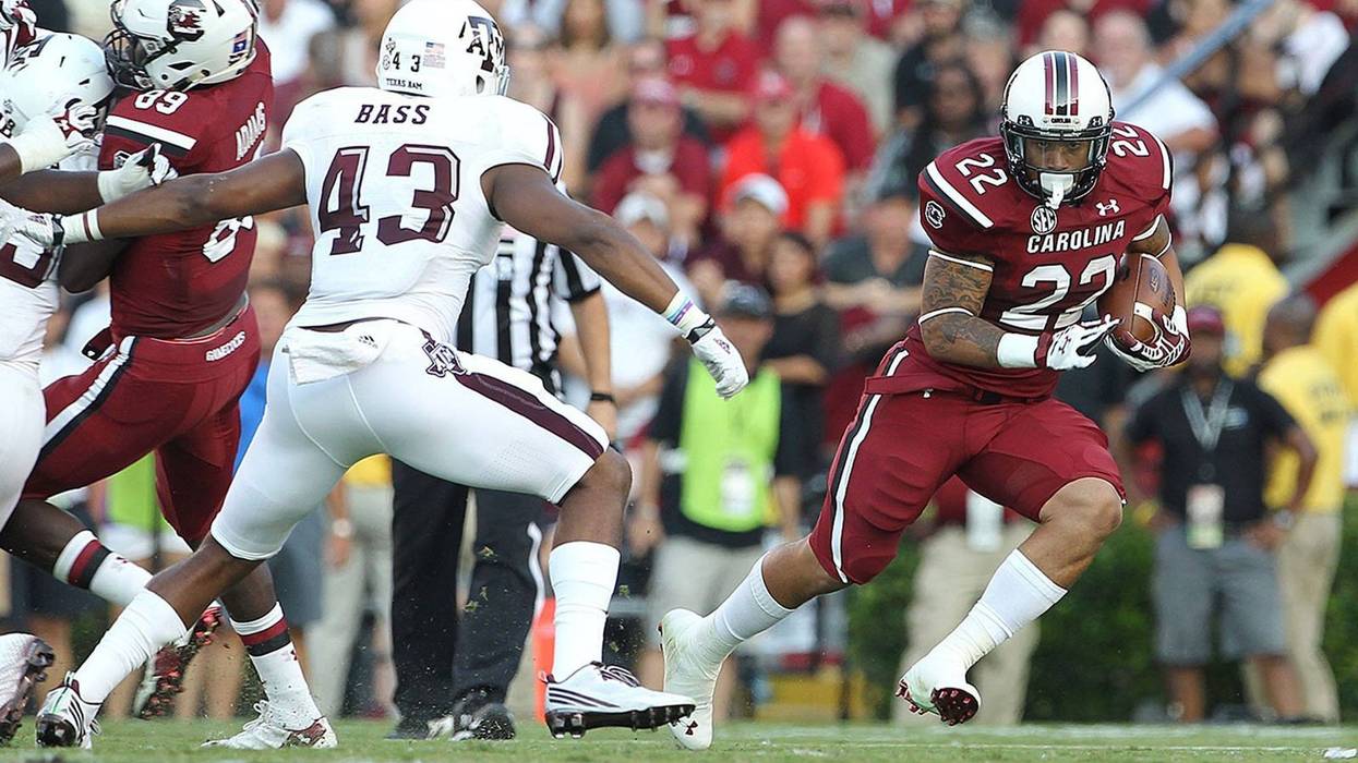 South Carolina running back Brandon Wilds (22) picks up yards in the first half against Texas A&M at Williams-Brice Stadium in Columbia, S.C., on Thursday, Aug. 28, 2014. (Photo by Kim Kim Foster-Tobin/The State/MCT/Sipa USA)