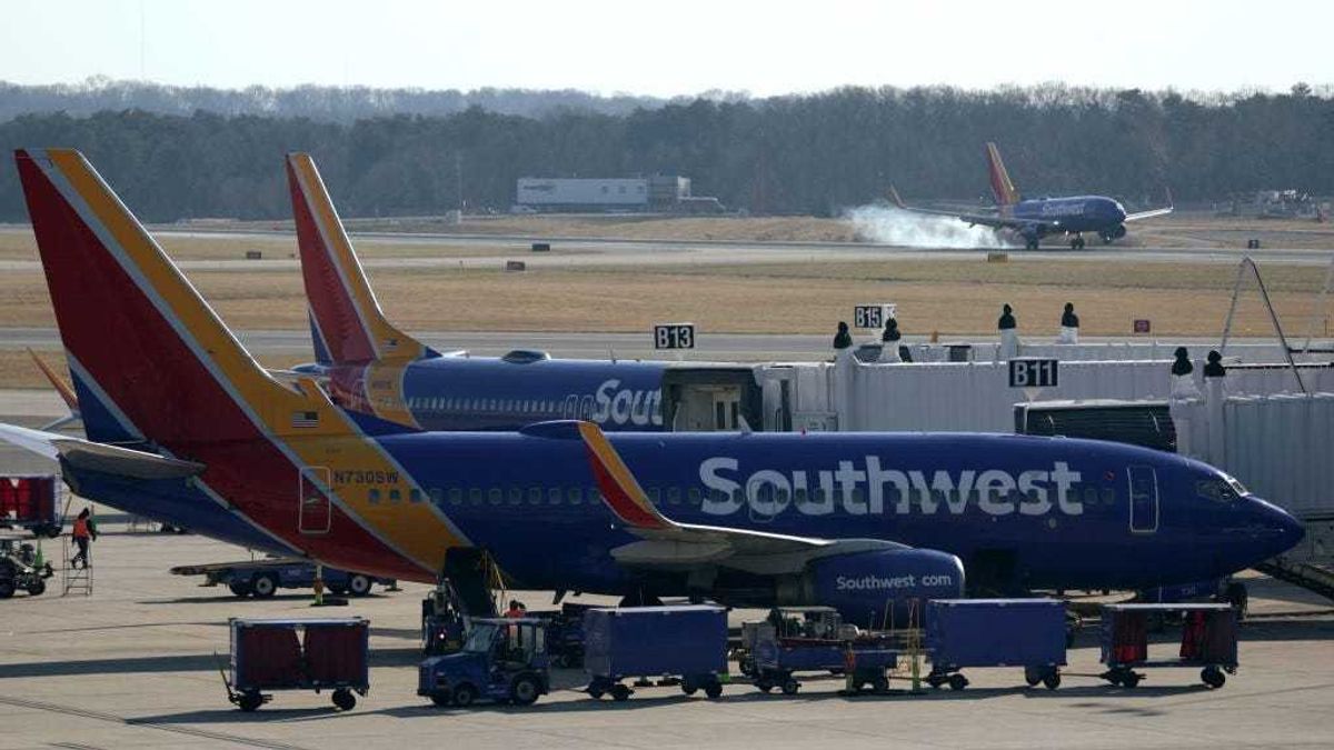 Southwest Airlines aircrafts are seen at Baltimore/Washington International Thurgood Marshall Airport (BWI) on December 22, 2021 in Baltimore, Maryland.