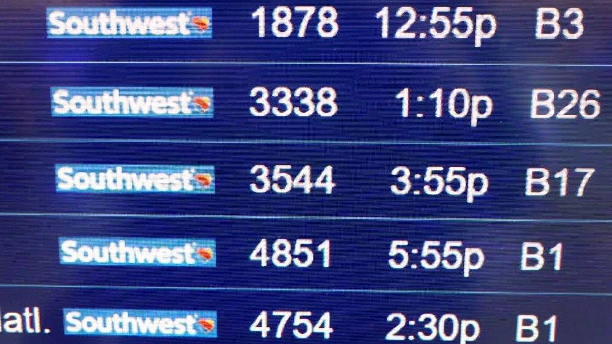 Southwest Airlines flights departing from Midway International Airport are posted on a board at the airport on January 28, 2021 in Chicago, Illinois.