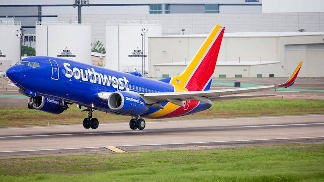 southwest airlines, southwest, fight attendant, overhead bin, hiding