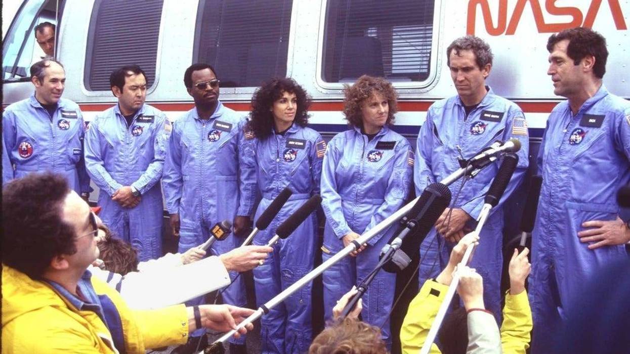 Space shuttle Challenger crew meeting the media at the launch pad
