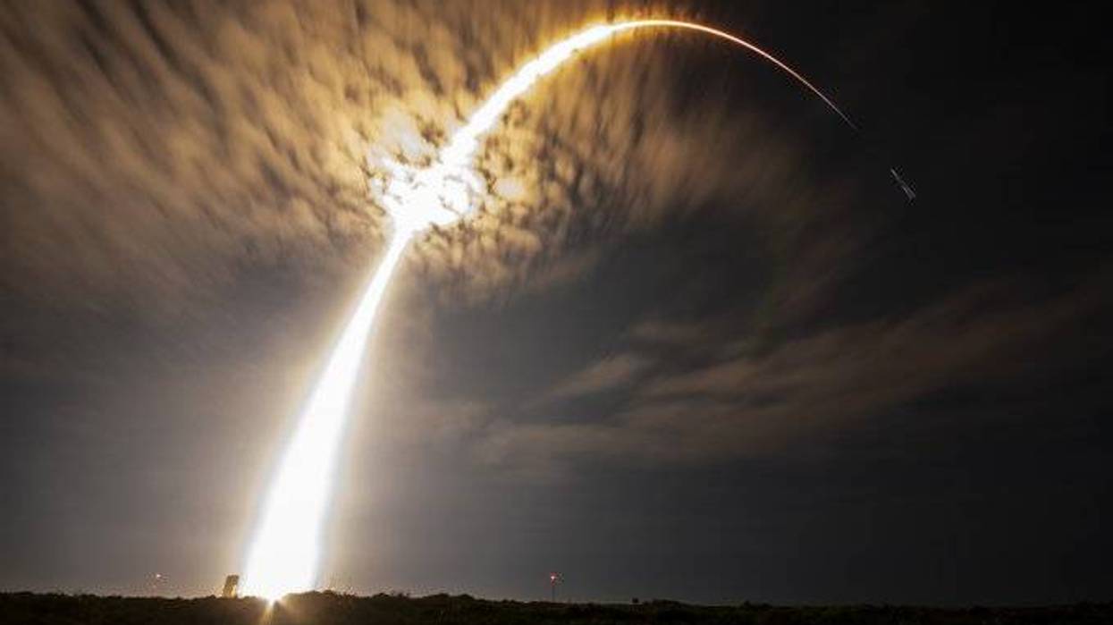 SpaceX put three rockets in orbit on Thursday, sending four astronauts to the International Space Station in record time for an American spacecraft, a rideshare batch from California, and a classified spy-satellite payload from Florida.